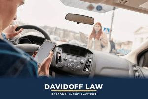Common causes of texting and driving car accidents in Queens